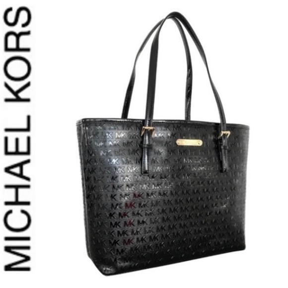 Michael Kors Handbags - NWT authentic MK monogram carry all tote black